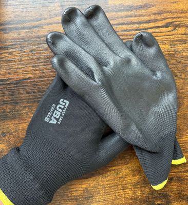 Gants polyester noir avec enduction PU noir sur paume - T9 - sachet de 12 paires