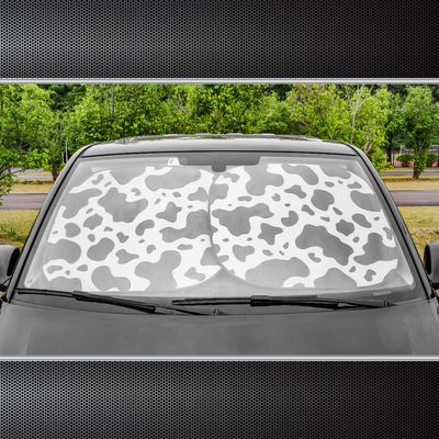 "Auto Drive windshield sunshade with cow print design, universal fit, 2-pack, 28 x 31.5 inches, protects against heat and UV rays."