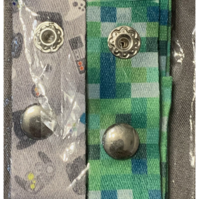 "2-pack Gamer Kids Mask Straps with green pixelated design and grey gaming controller print, featuring easy-to-use clips for securing masks."