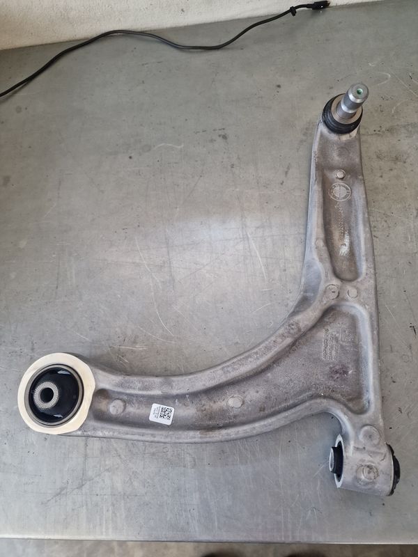 LOWER CONTROL ARM FRONT RH ASM