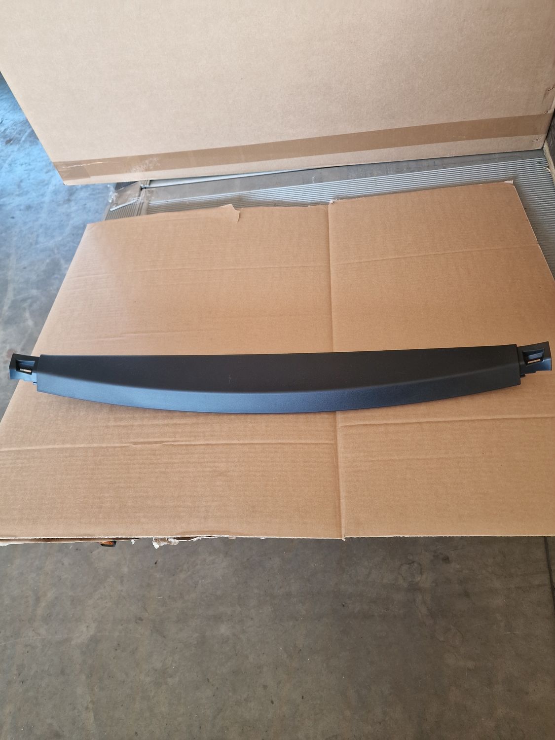 TAIL GATE UPPER TRIM ASSY
