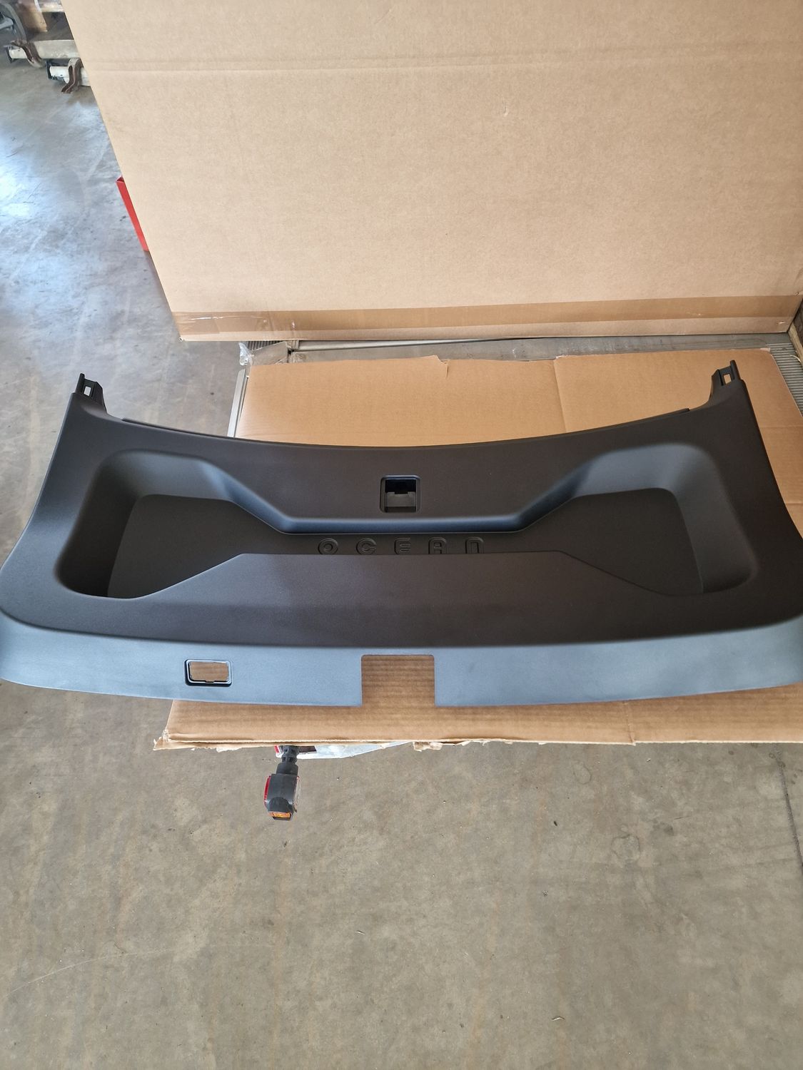 TAIL GATE TRIM LOWER ASSY