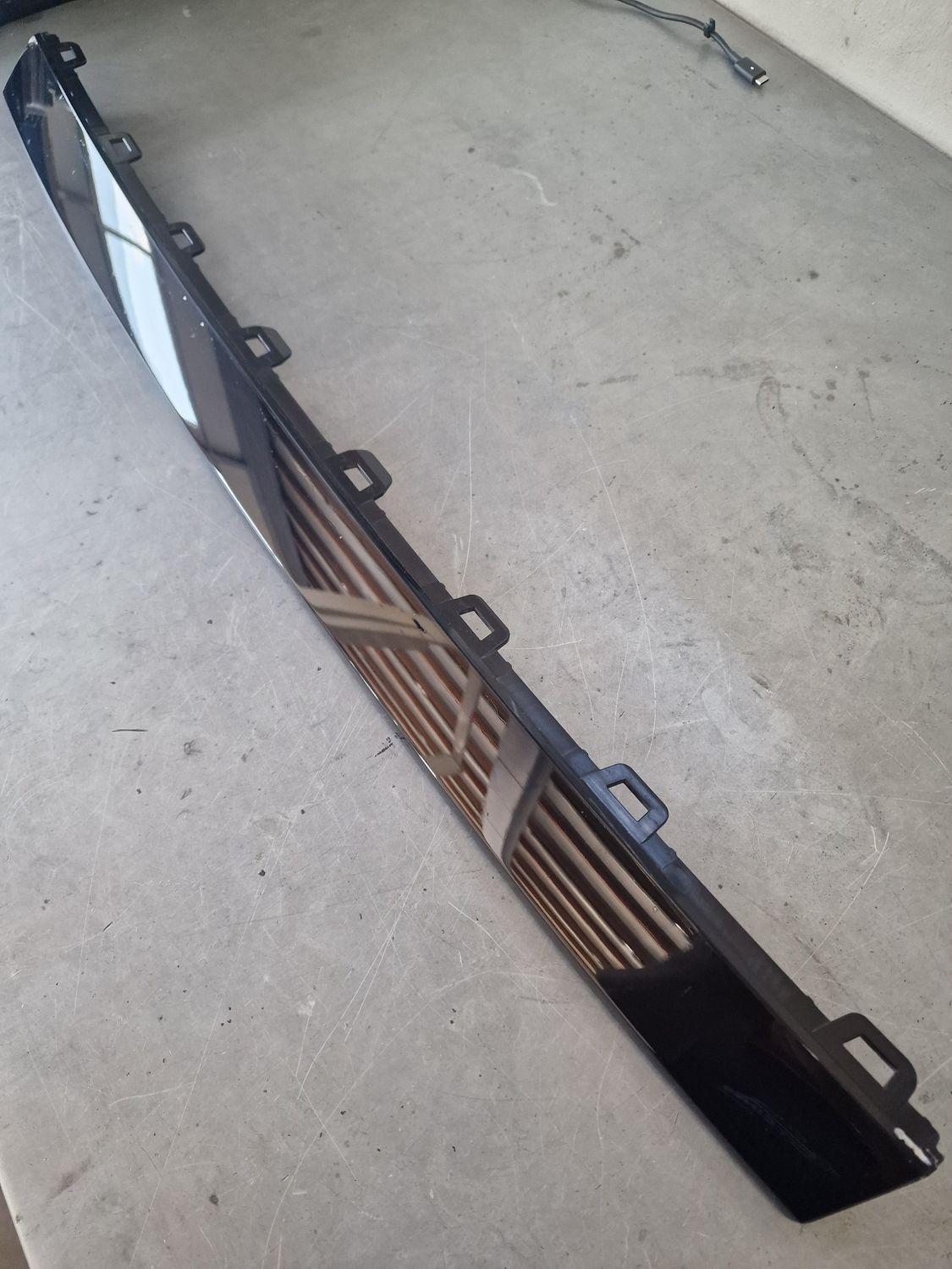 FRONT BUMPER UPPER STRIP