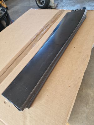 DOOR CLADDING ASM RR LH with a smooth surface