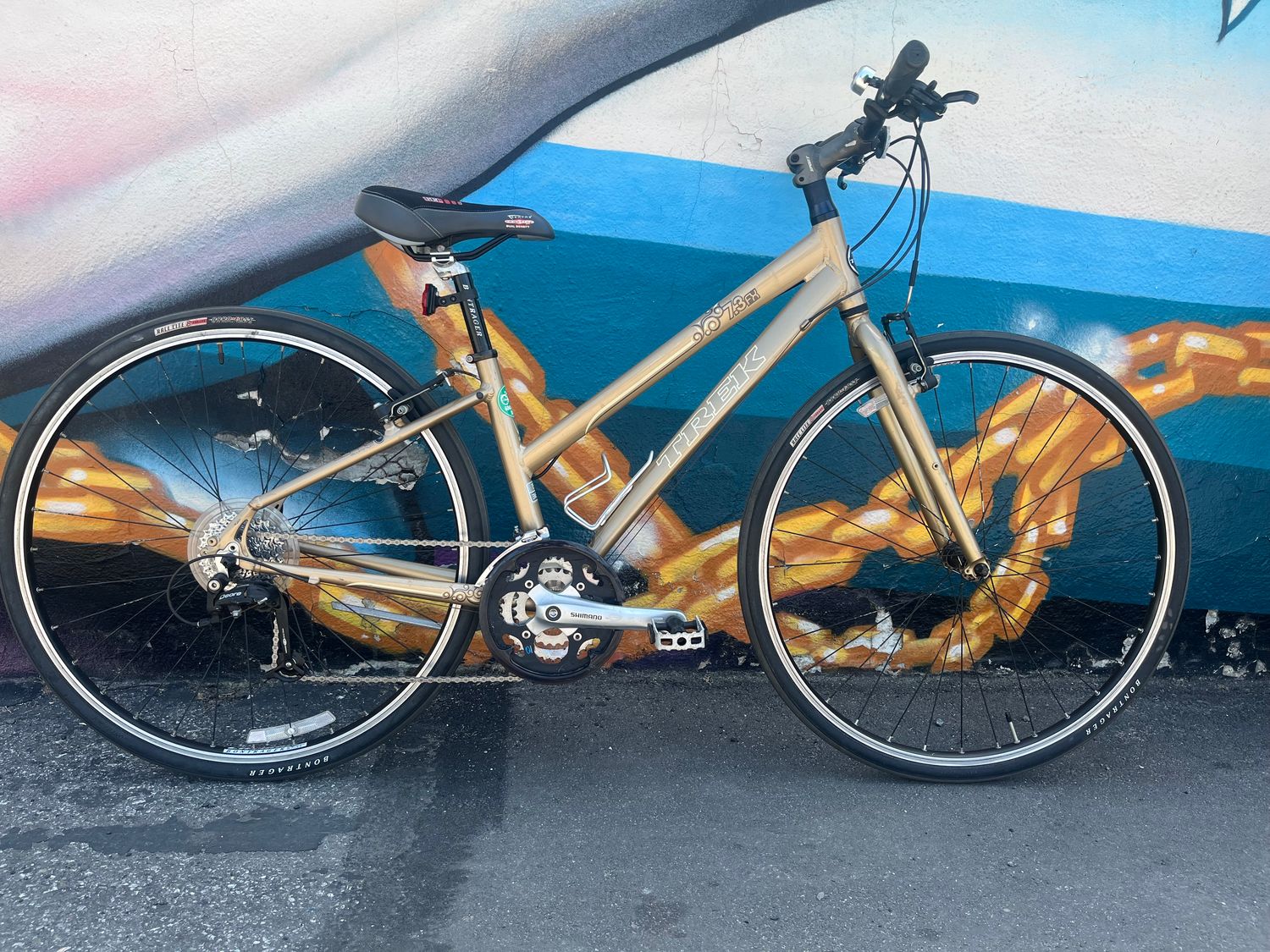 used Trek FX 7.3, gold, small