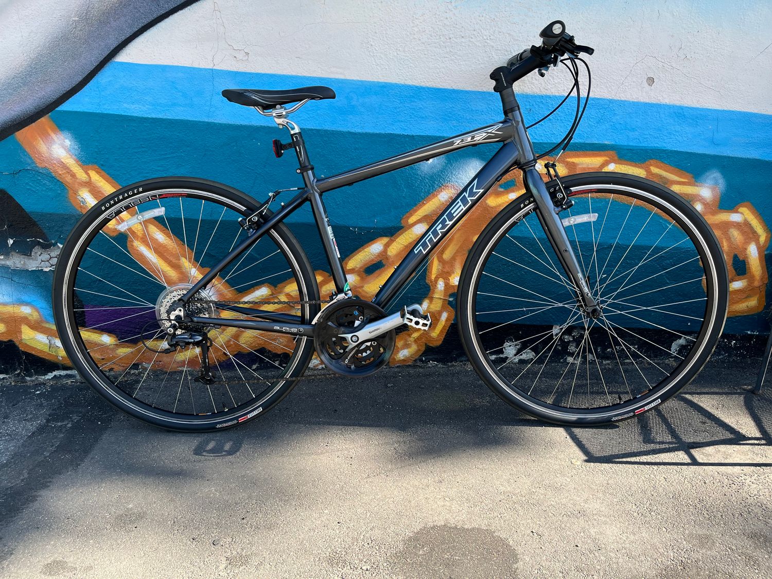 used Trek FX7.3, gray/silver, medium