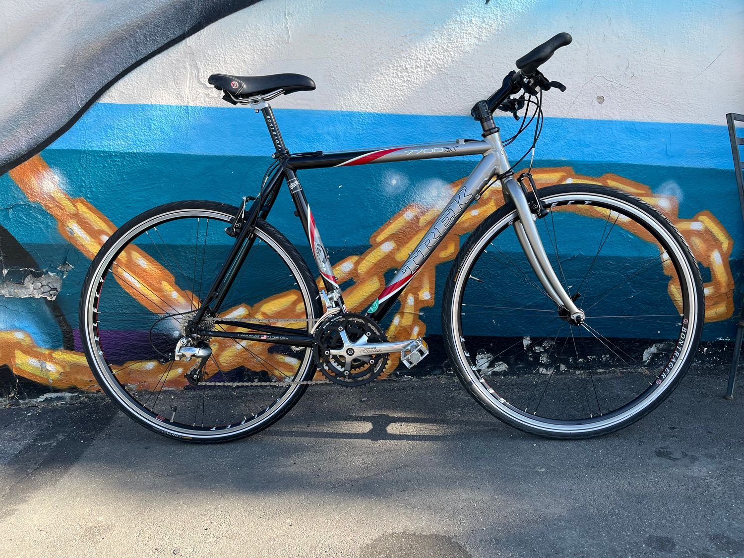 used Trek 7700FX, silver/red/black, 56cm