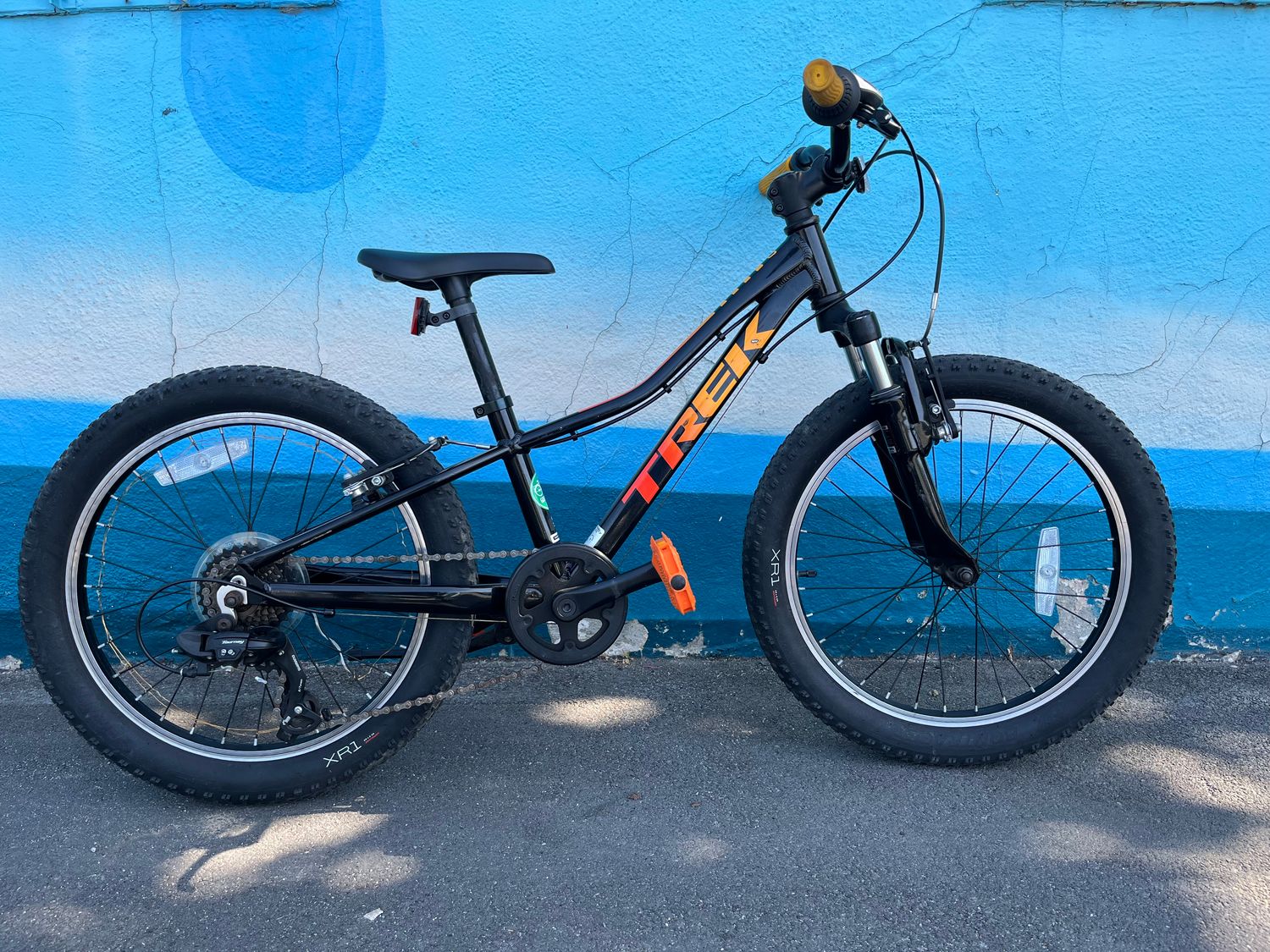 used Trek Precaliper 6-speed, black/yellow-orange fade 20&quot; wheel