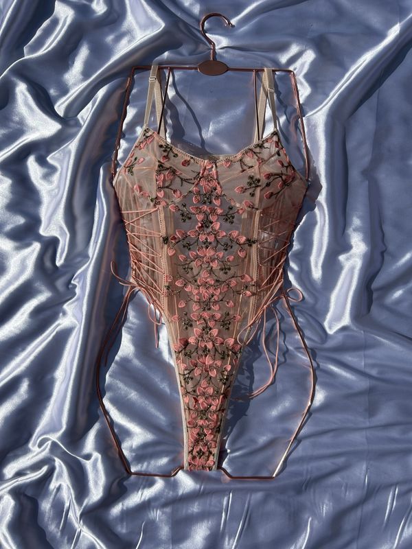 Seductive Embroidered Mesh Lace-Up Bodysuit for a Bold, Elegant Look
