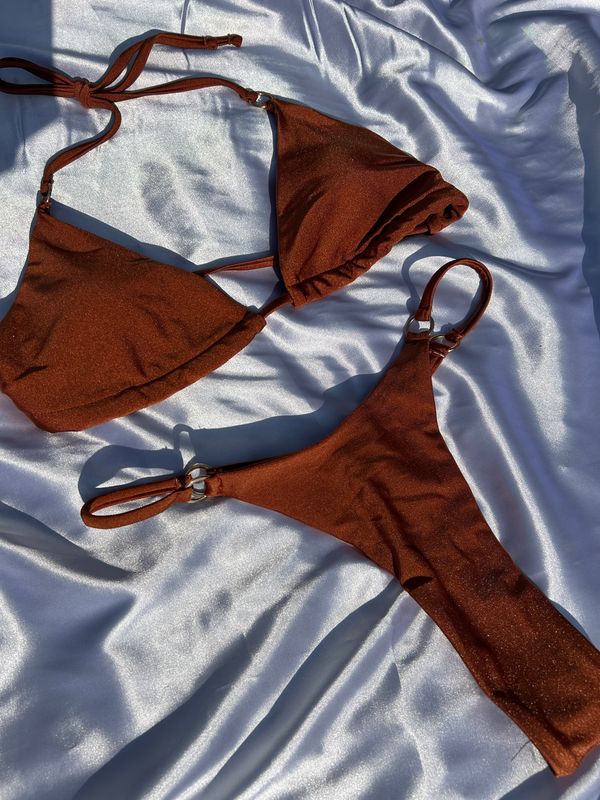 Sizzle the night away in this bronze beauty.