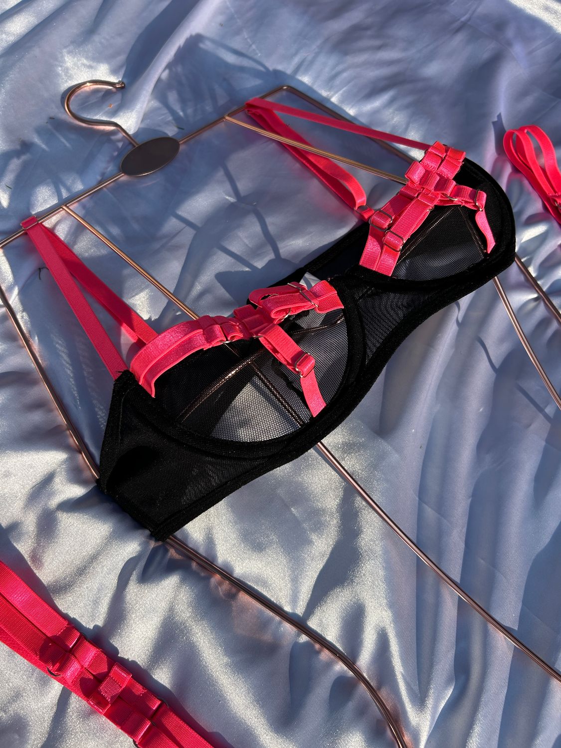 Pink Lightning: Bold Black Lingerie with Eye-Catching Neon Pink Straps and a Playful Thong