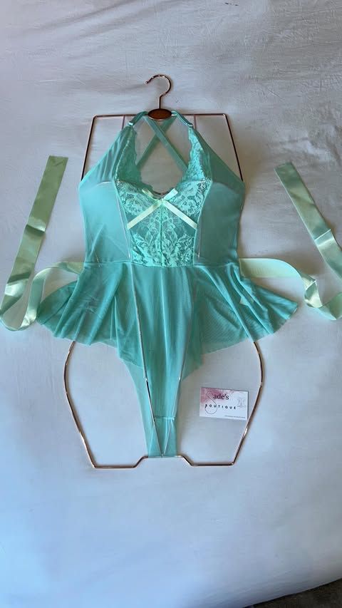 Mint blue contrast lace mesh bow front ruffle hem bodysuit