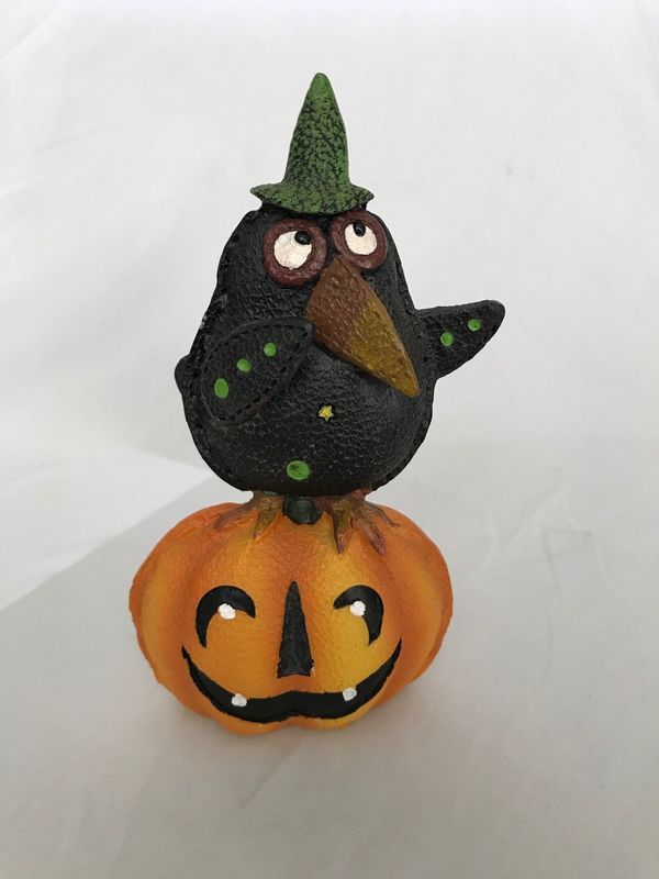 Halloween Crow on a Pumpkin Figurine