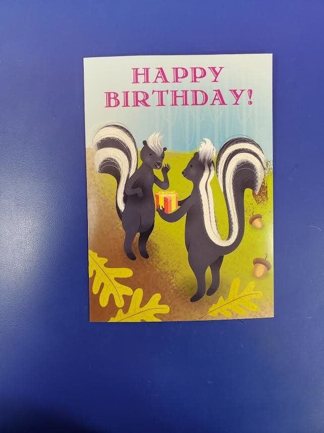 Skunks With Presents Birthday Card