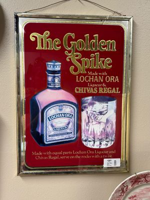 The Golden Spike Liquer Mirror Advertising