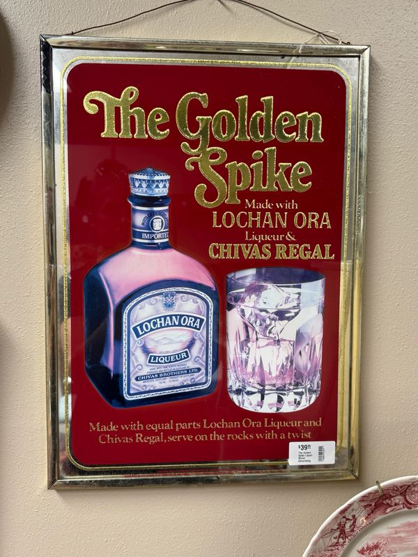 The Golden Spike Liquer Mirror Advertising