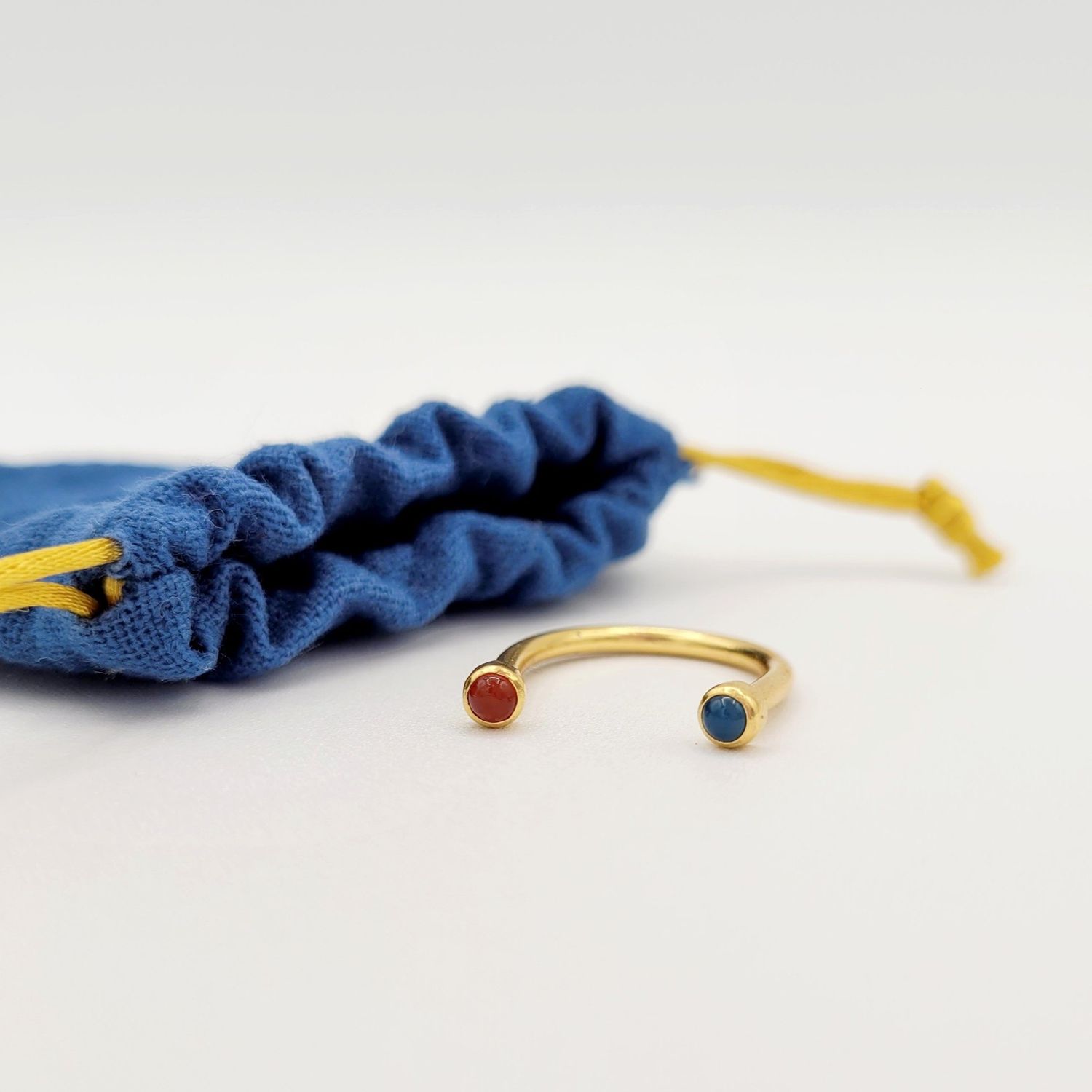 Jorge Morales: Horseshoe Ring |, Type: Brass/GP - Carnelian/Blue Agate