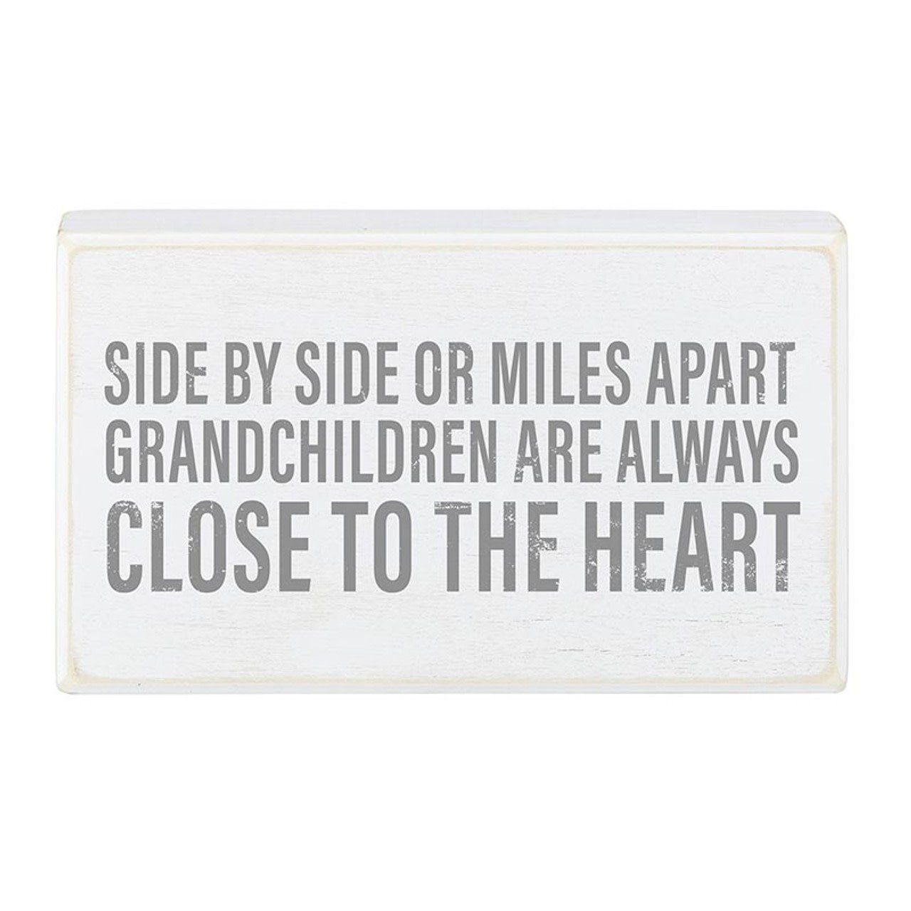 Miles Apart sign