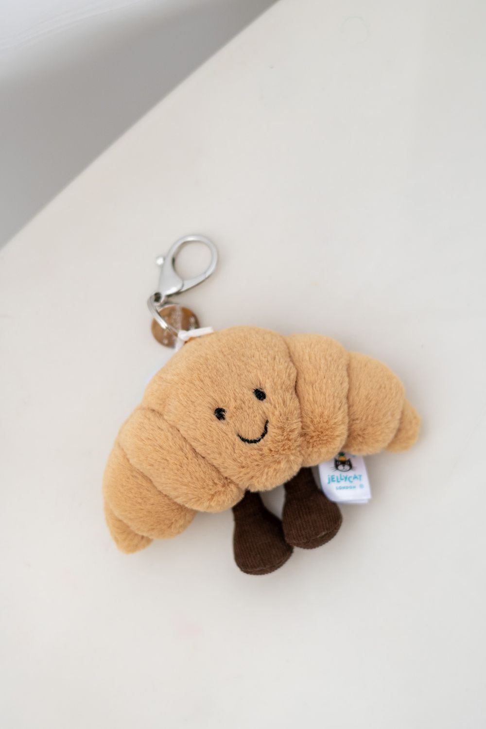 Jellycat Breloczek Wesoły Croissant 16 cm