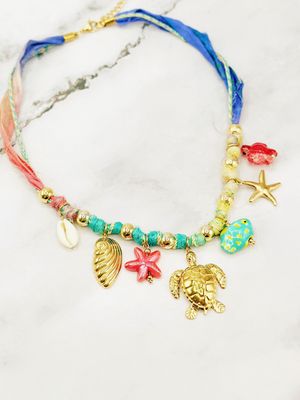 KETTING MET BEDELTJES SCHILPAD