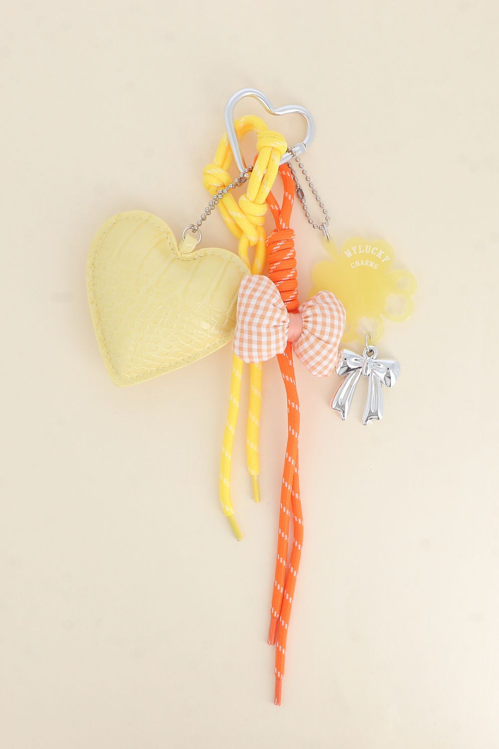 SLEUTELHANGER-BAG CHARMS HART GEEL