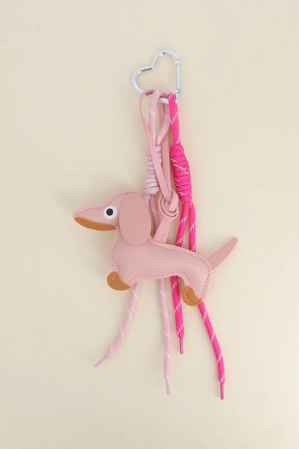 SLEUTELHANGER- BAG CHARMS TECKEL LICHT ROZE