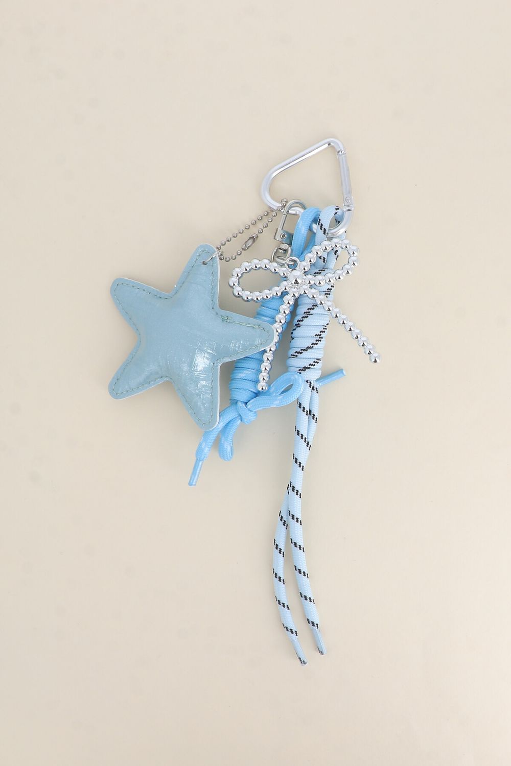 SLEUTELHANGER- BAG CHARMS STER BLAUW
