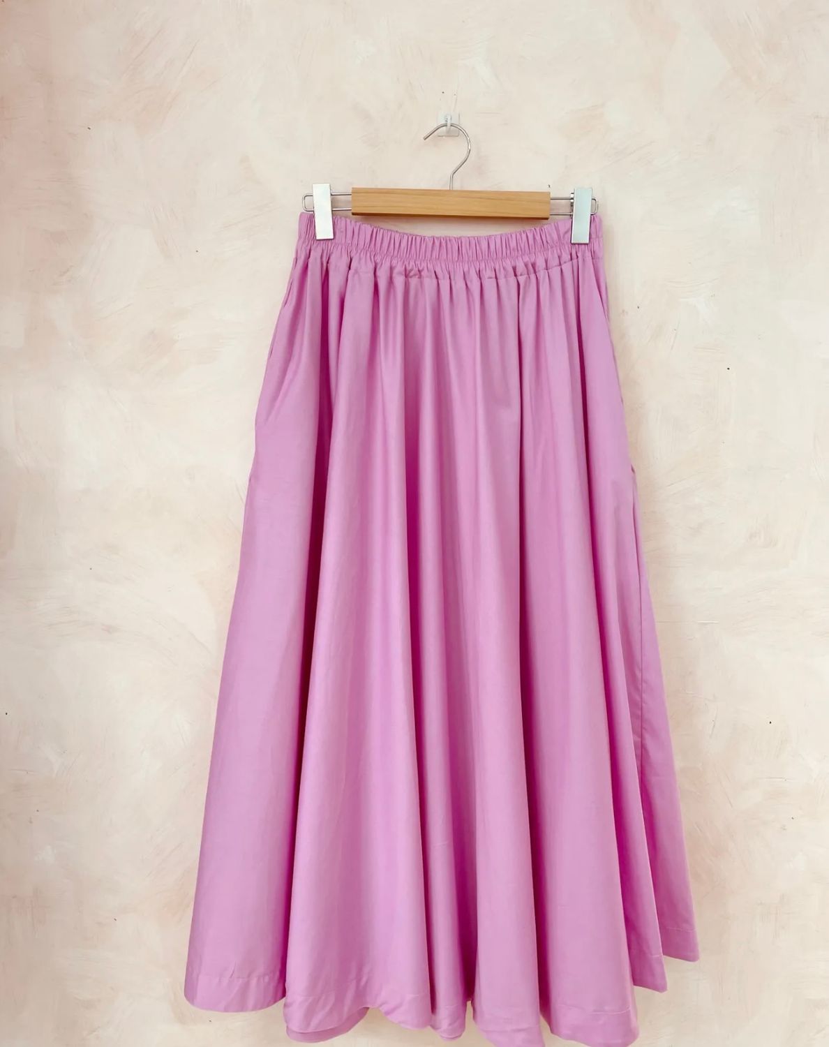 LANGE ROK MET ZAKKEN ROZE