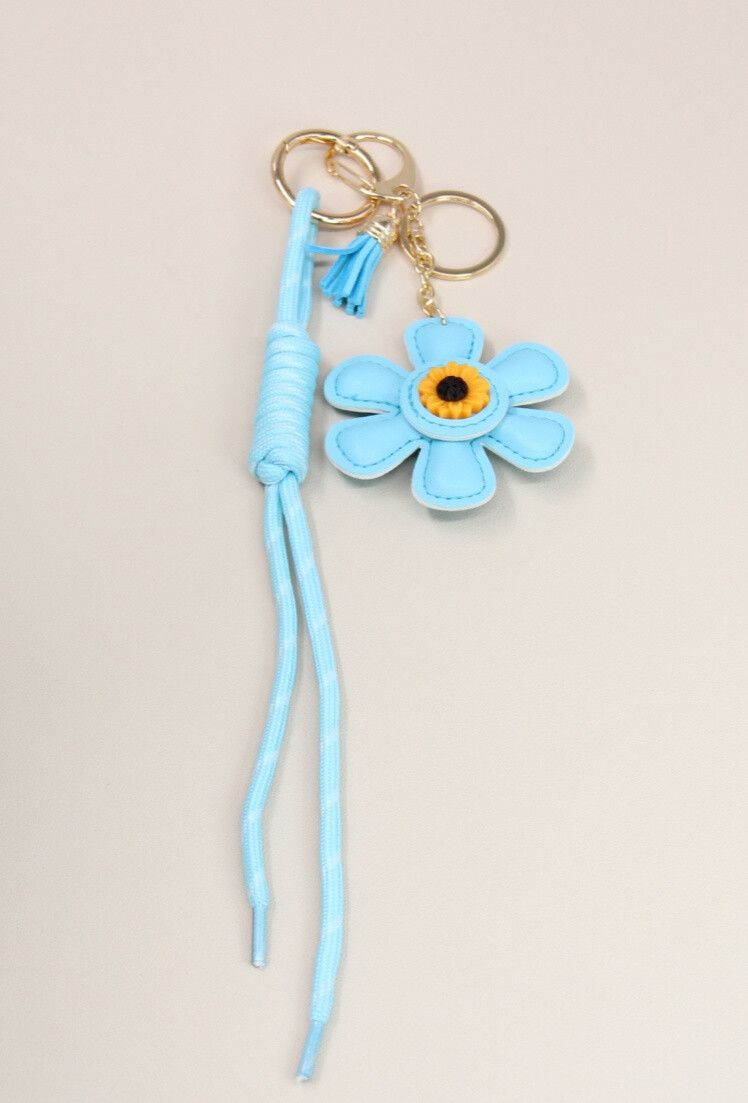 SLEUTELHANGER-BAG CHARMS BLOEM LICHTBLAUW