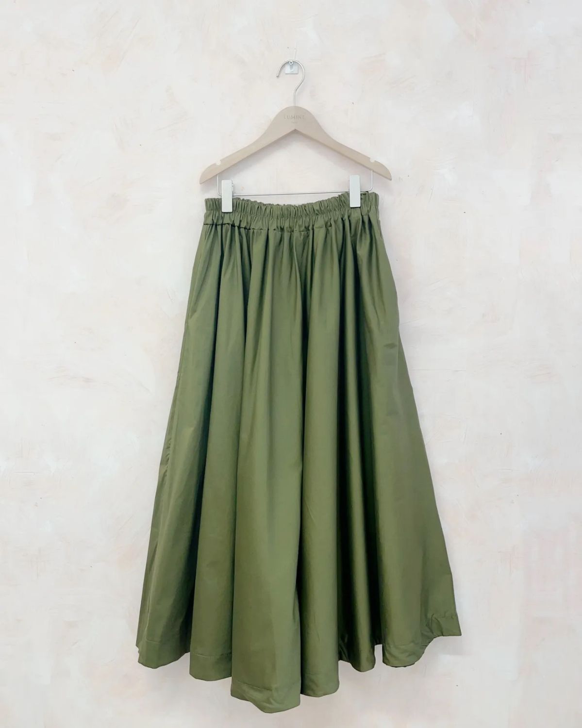 LANGE ROK MET ZAKKEN KAKI