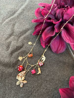 KETTING MET COWBOYLAARS, BLOEM,…