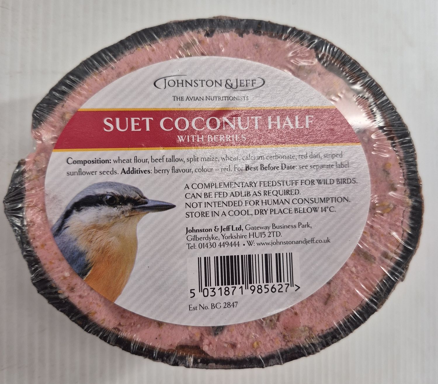 Coconut half with berries