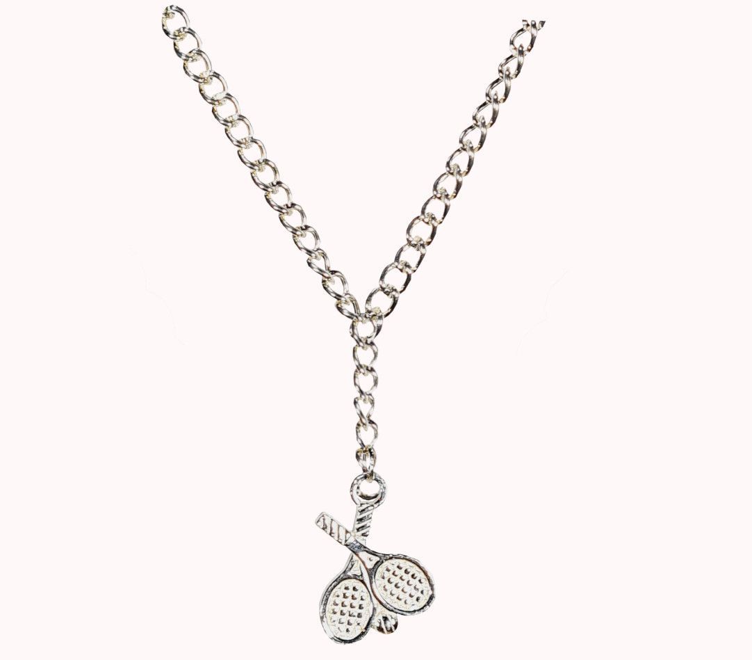Small silver crossed tennis racquet on a silver chain