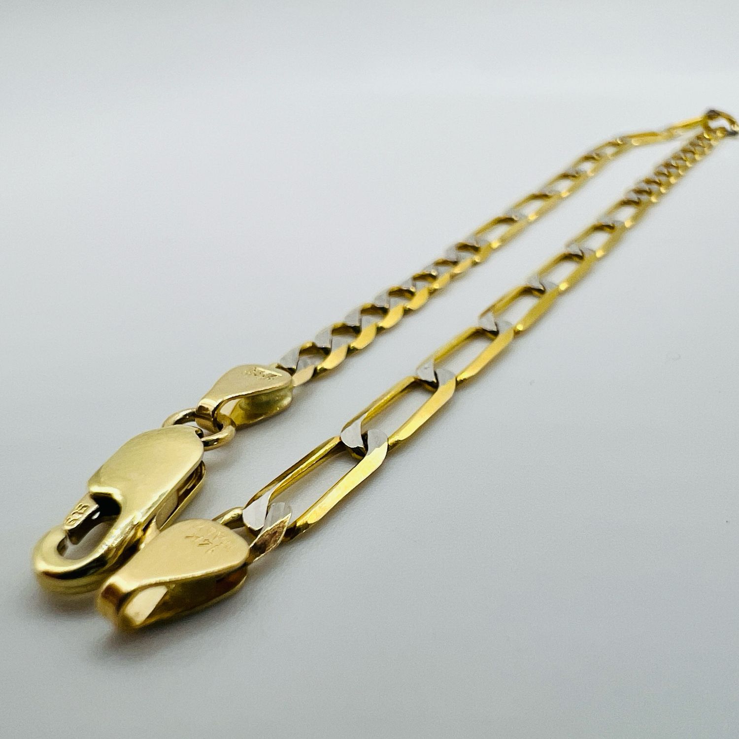 Pulsera Inglesa 7x10 diamantada 4&#39; 14k