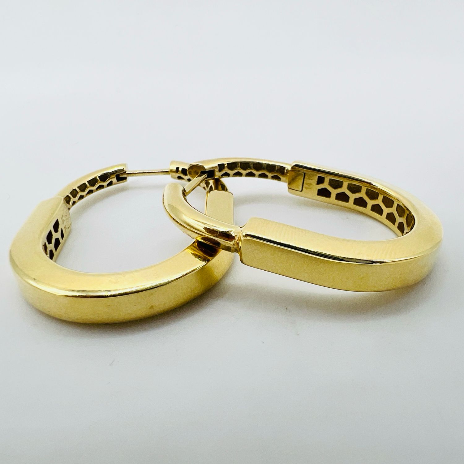 Arracadas TFFY lock 14k