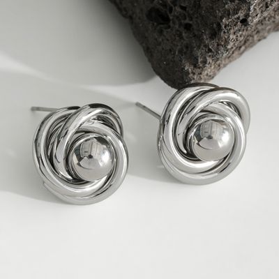 Zilverkleurige dikke gevlochten creolen met bol