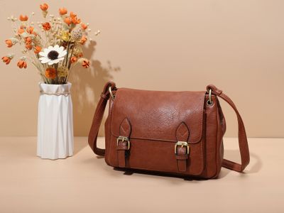 Vintage schoudertas met gespsluiting