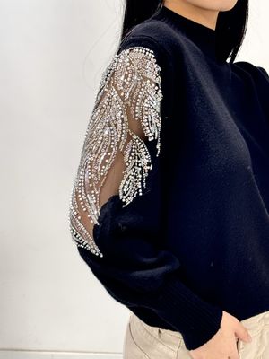 Truitje met kanten-glitter mouw