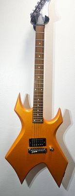 ​The B.C. Rich Warlock CUSTOM candy tangerine pearl coat paint!