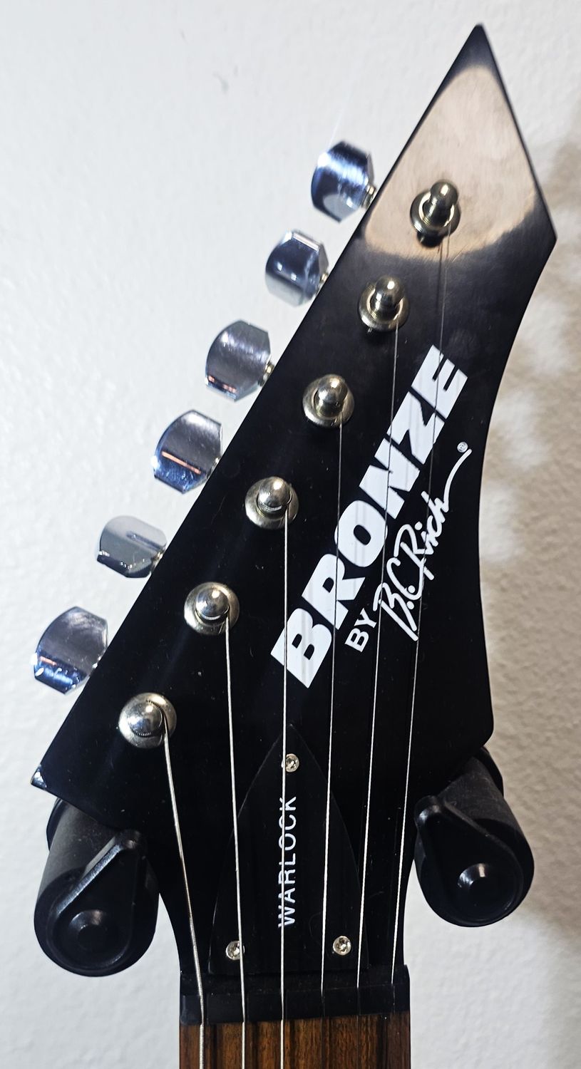 ​The B.C. Rich Warlock CUSTOM candy tangerine pearl coat paint!