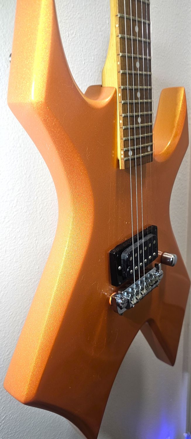 ​The B.C. Rich Warlock CUSTOM candy tangerine pearl coat paint!