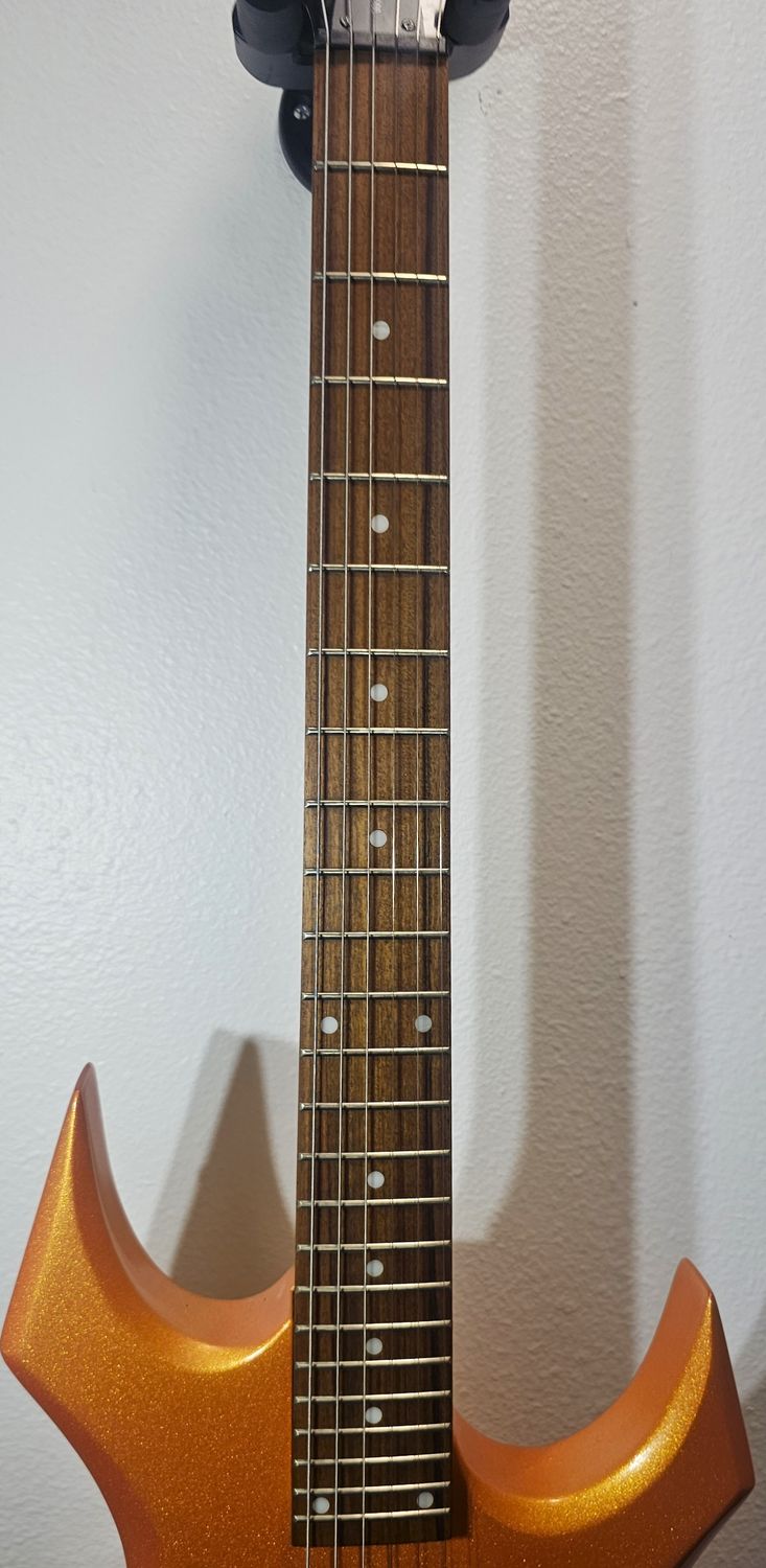 ​The B.C. Rich Warlock CUSTOM candy tangerine pearl coat paint!