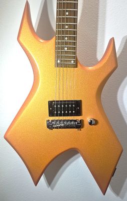 ​The B.C. Rich Warlock CUSTOM candy tangerine pearl coat paint!