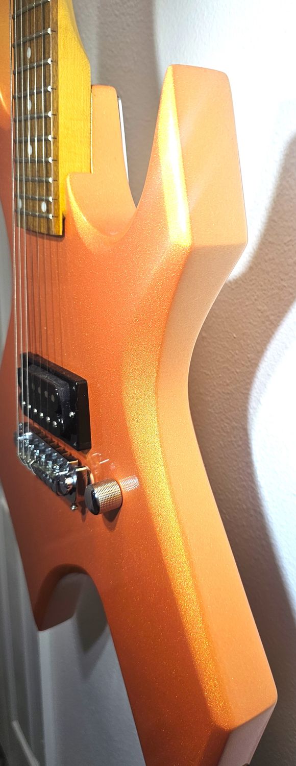 ​The B.C. Rich Warlock CUSTOM candy tangerine pearl coat paint!