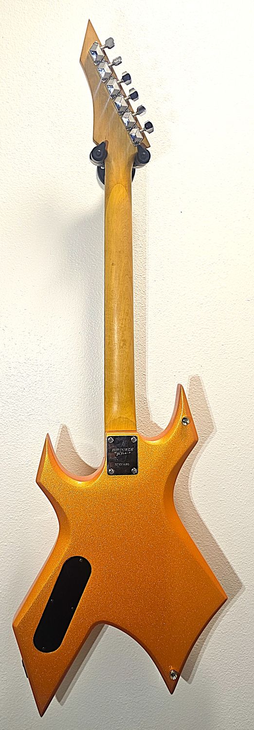 ​The B.C. Rich Warlock CUSTOM candy tangerine pearl coat paint!