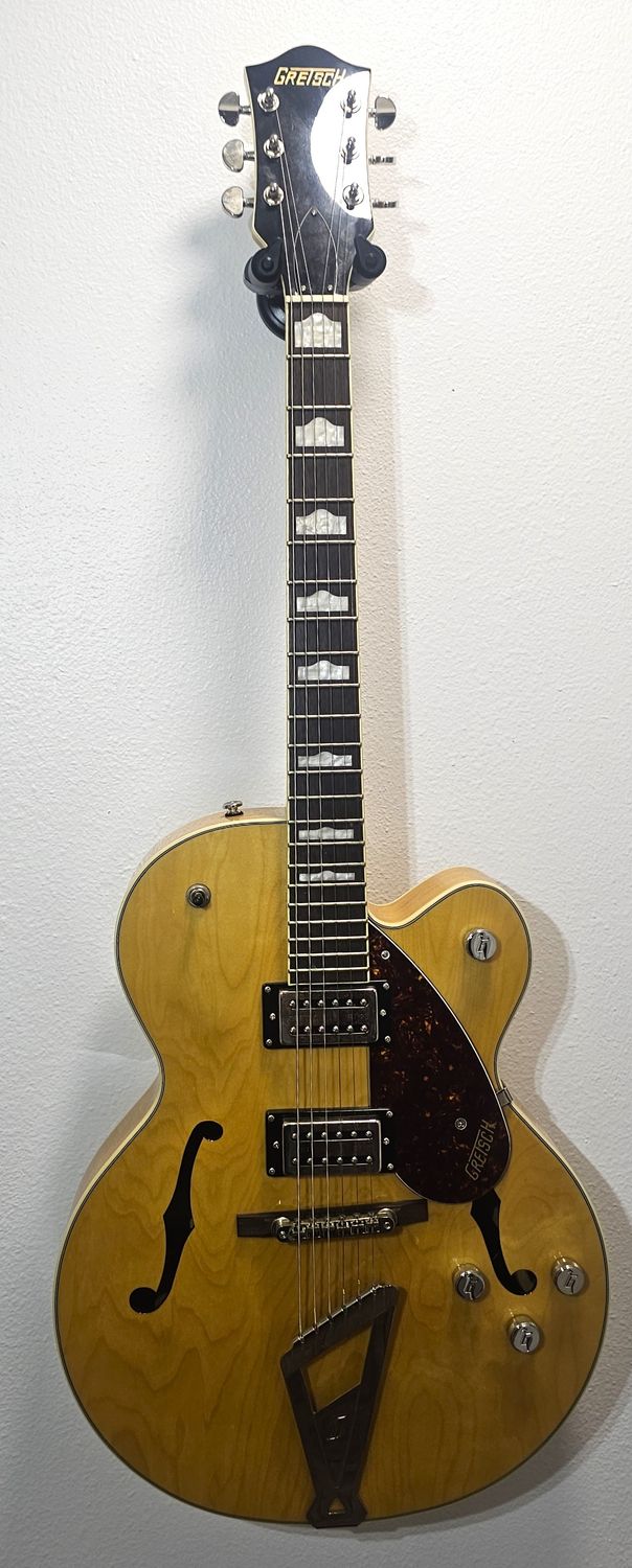 Gretsch G2420VLAME Hollowbody Village Amber The Gretsch hollowbody combines the past &amp; present for exceptional sound &amp; style. Featuring Broad&#39;Tron BT-3S humbuckers, push/pull knob,