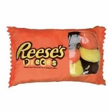 REESE PIECES PILLOW WITH 6 PIECES INSIDE