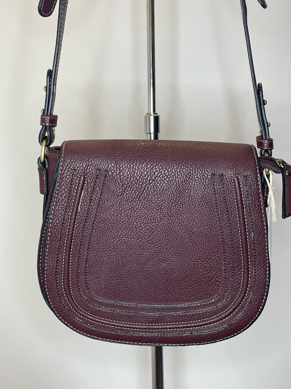 Sleek Maroon Crossbody Bag with Gold Hardware