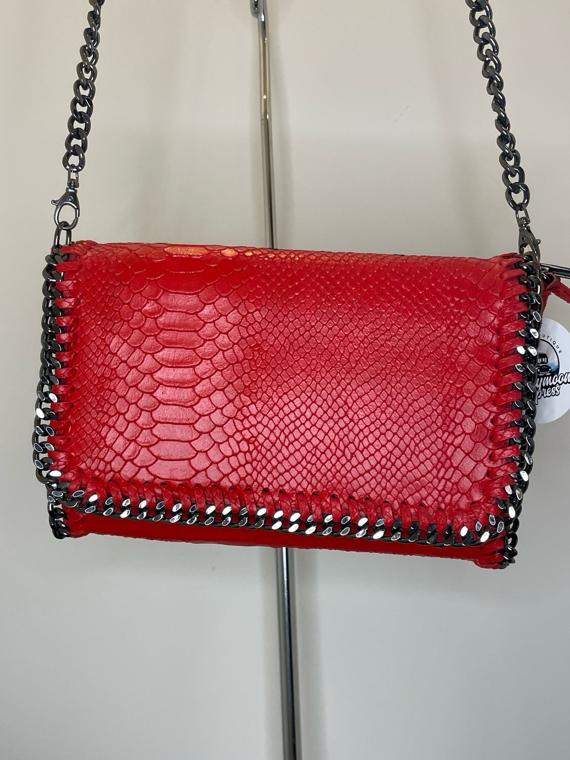 Red Snake skin purse with chain trim