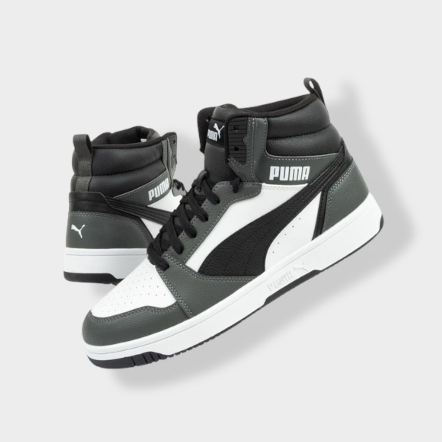 Puma Rebound V6 sneaker - Zwart/Wit - Leer diagonaal achteraanzicht